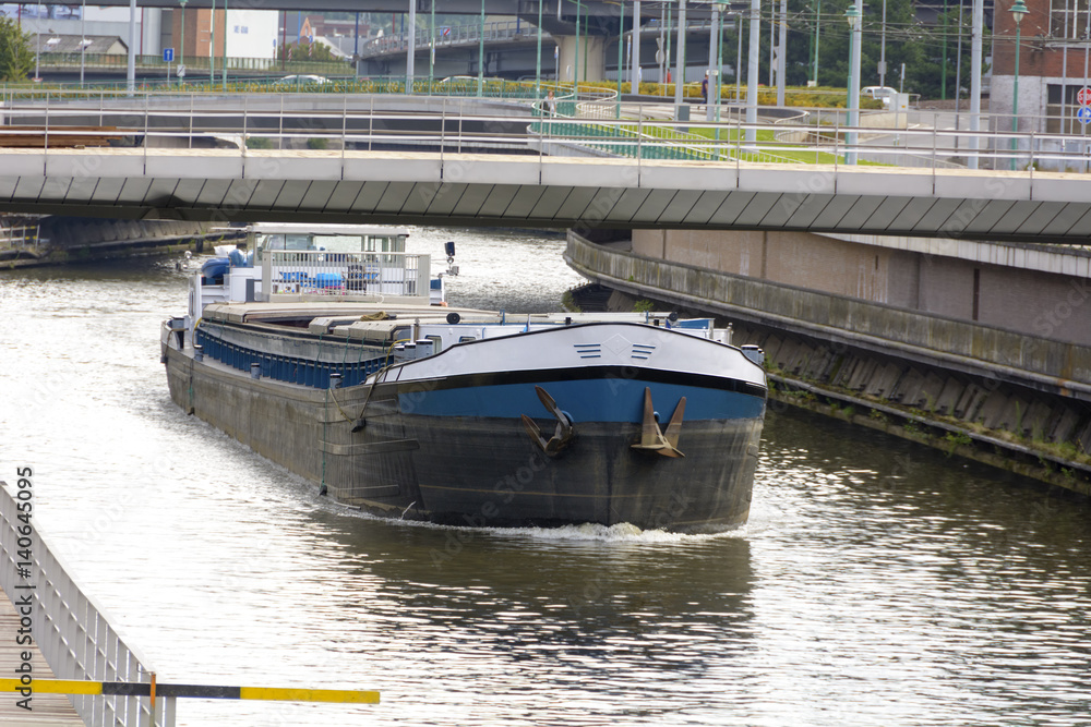 River Cargo Ship / River cargo ship goes from canal