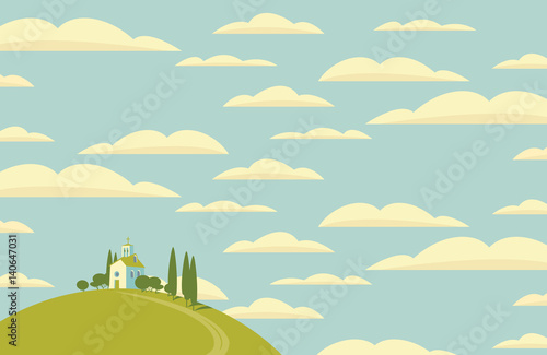 spring landscape with Village on the hill and sky with clouds