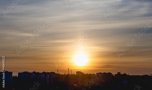 Voronezh city at sunset, against a colorful sky, panoramic aerial view from roof