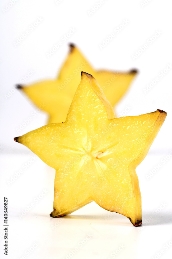 Carambola on white background - slices Carambola on white background - slices