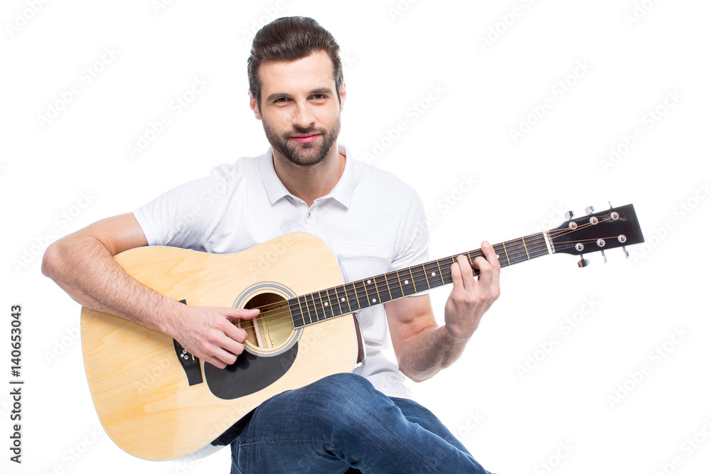 Obraz premium Young man with guitar
