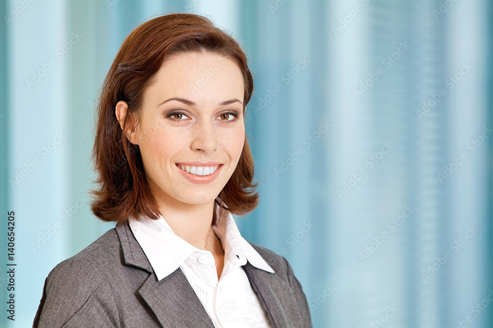 Portrait of young caucasian businesswoman in office Portrait of young caucasian businesswoman in office