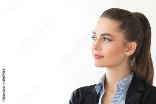 Portrait of young beautiful business woman on white background