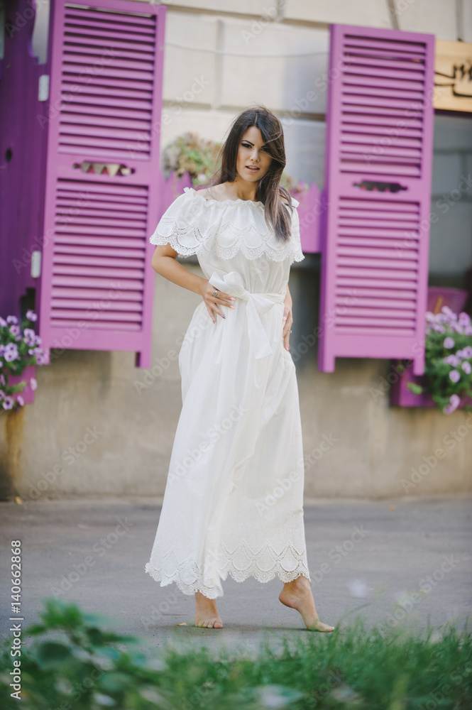 Fototapeta premium brunette in a dress