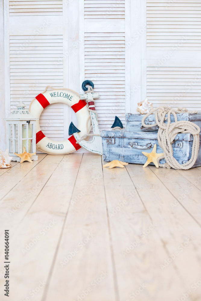 Decor in the style of sea travel, Suitcases and anchor, lifebuoy, lantern Decor in the style of sea travel, Suitcases and anchor, lifebuoy, lantern