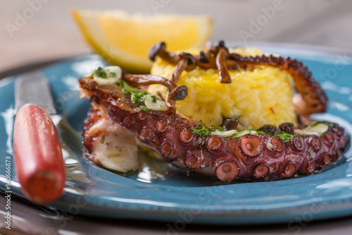 Grilled Seafood Octopus on Saffron Risotto with Brown Shimeji Mushrooms