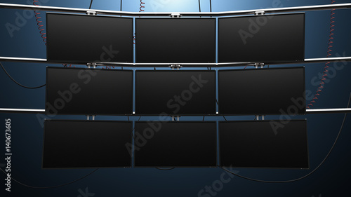 Nine Panel Video Monitor Wall. a futuristic nine panel video wall with blank screens and cords mounted on pipes