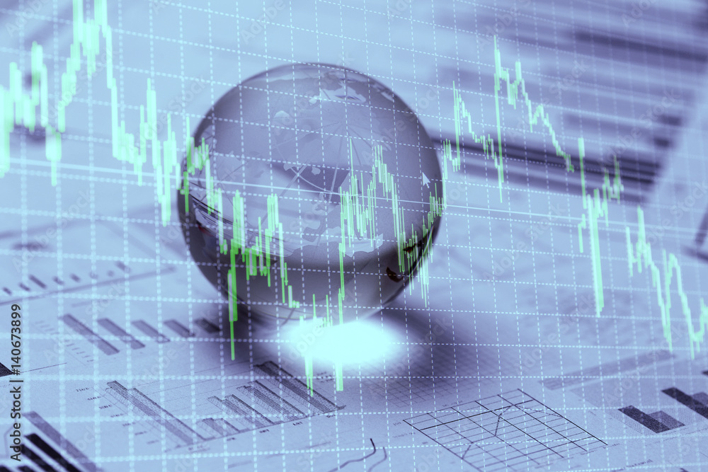 Glass world globe rest on financial sheet