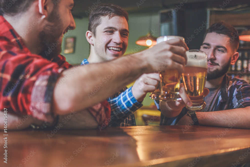 Group Of Hipster Friends Drinking Craft Beer focus on Hipster Group Of Hipster Friends Drinking Craft Beer focus on Hipster