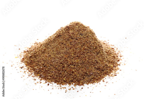 Milled flaxseed isolated on white background, clipping path, top view