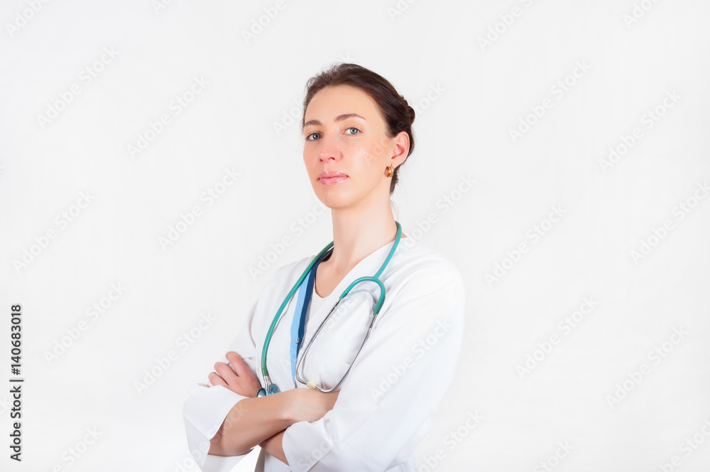Portrait of young attractive doctor, surgeon, nurse with stethoscope Portrait of young attractive doctor, surgeon, nurse with stethoscope