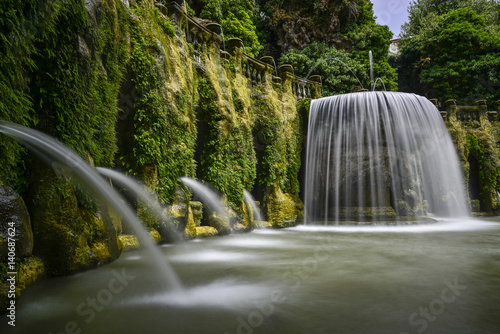 waterfall and garden of the villa of cardinal Ippolito d`Este, Tivoli, Italy. photo