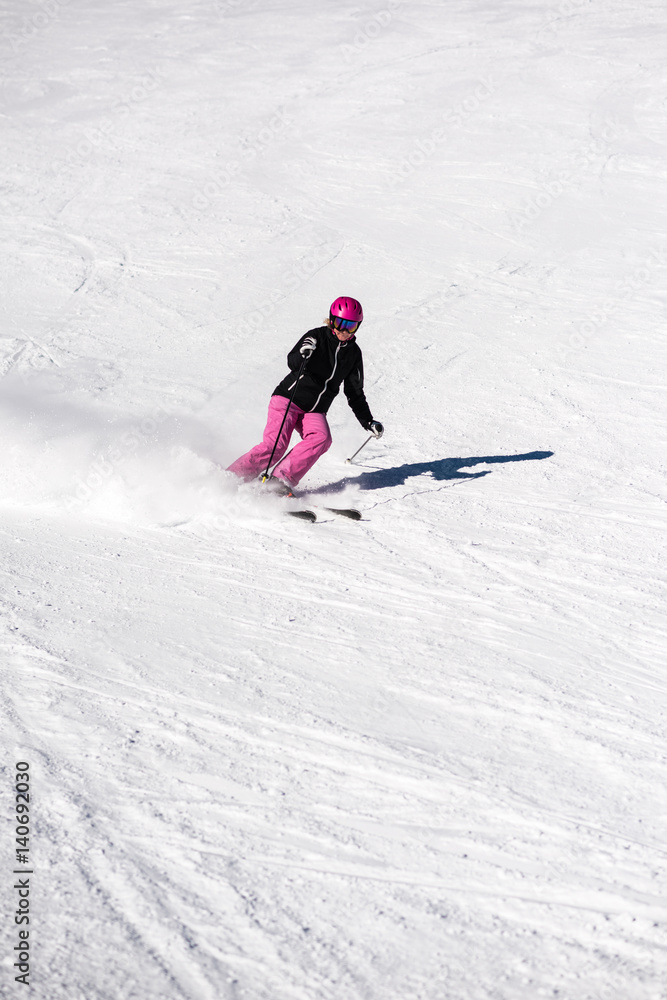 Female skier in fresh powder snow Female skier in fresh powder snow