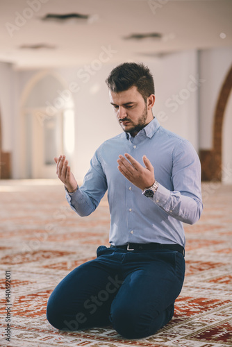 Modest Muslim praying