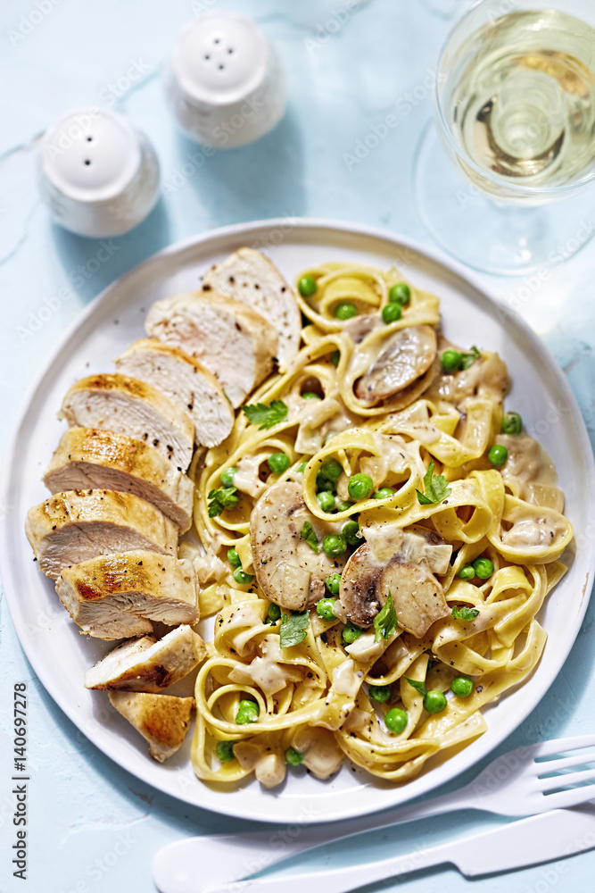 Chicken breast with pasta in mushroom and peas sauce Chicken breast with pasta in mushroom and peas sauce