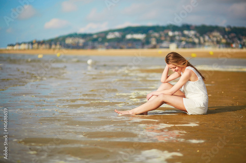 Woman enjoying her vacation by ocean or sea