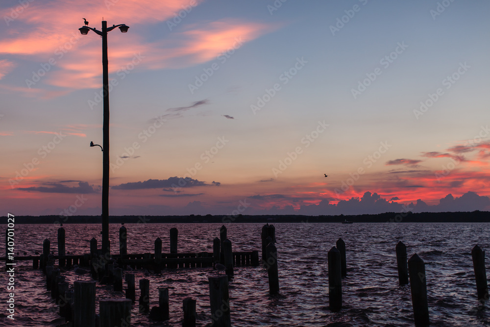 Sunset over docks in Chesapeake Bay.