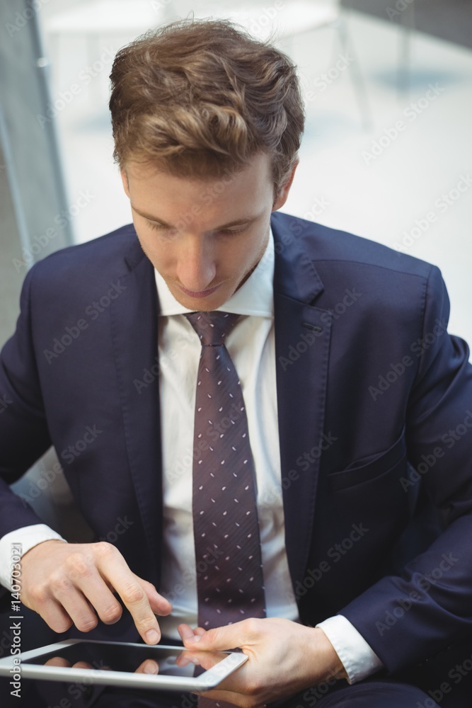 Businessman using digital tablet Businessman using digital tablet