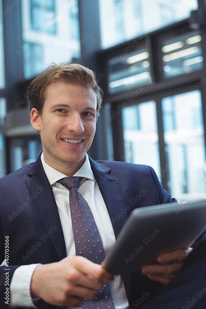 Businessman using digital tablet at office Businessman using digital tablet at office