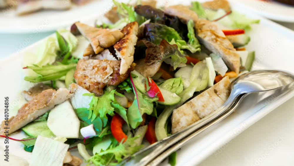 Table with a dish of mix salad in the restaurant. The culture of healthy food. Prepare Banquet buffet table with appetizers for the holiday. A place for meal people. Table with a dish of mix salad in the restaurant. The culture of healthy food. Prepare Banquet buffet table with appetizers for the holiday. A place for meal people.