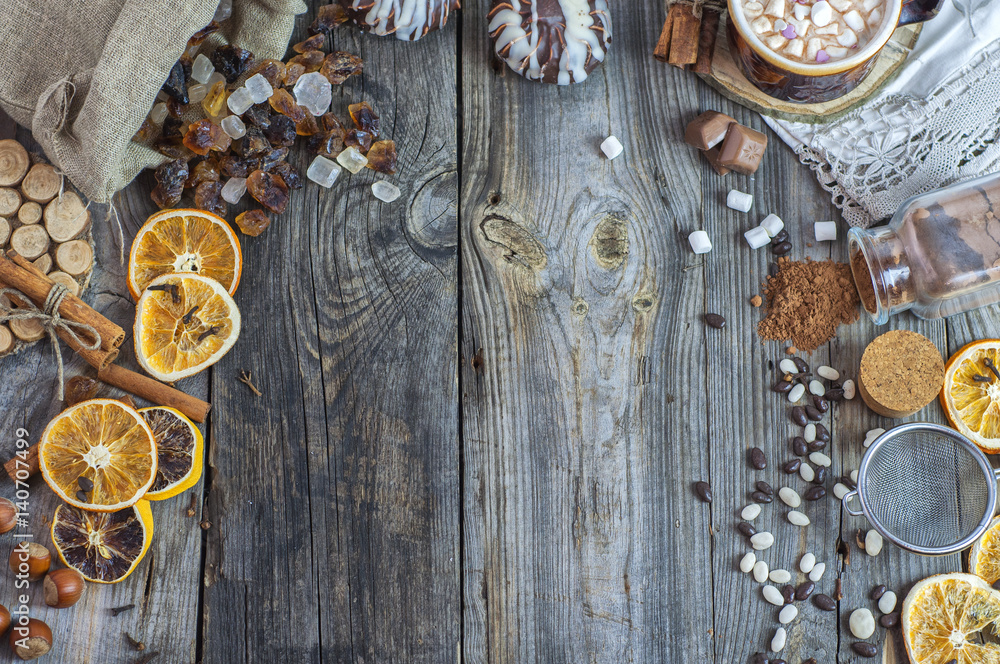 Brown sugar, candy and a cup with a drink on an old wooden surface Brown sugar, candy and a cup with a drink on an old wooden surface