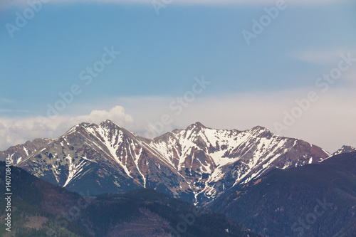 Snow melting on the mountains peak. Spring in Slovakia