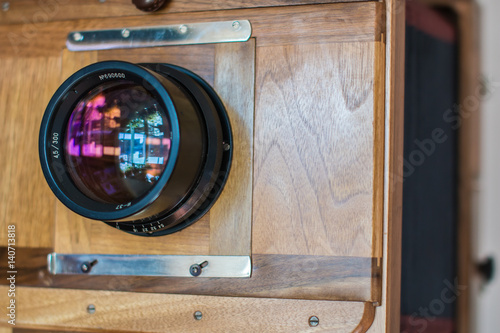 Lens of an old big wooden camera macro view, concept