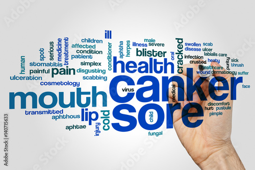 Canker sore word cloud concept on grey background photo