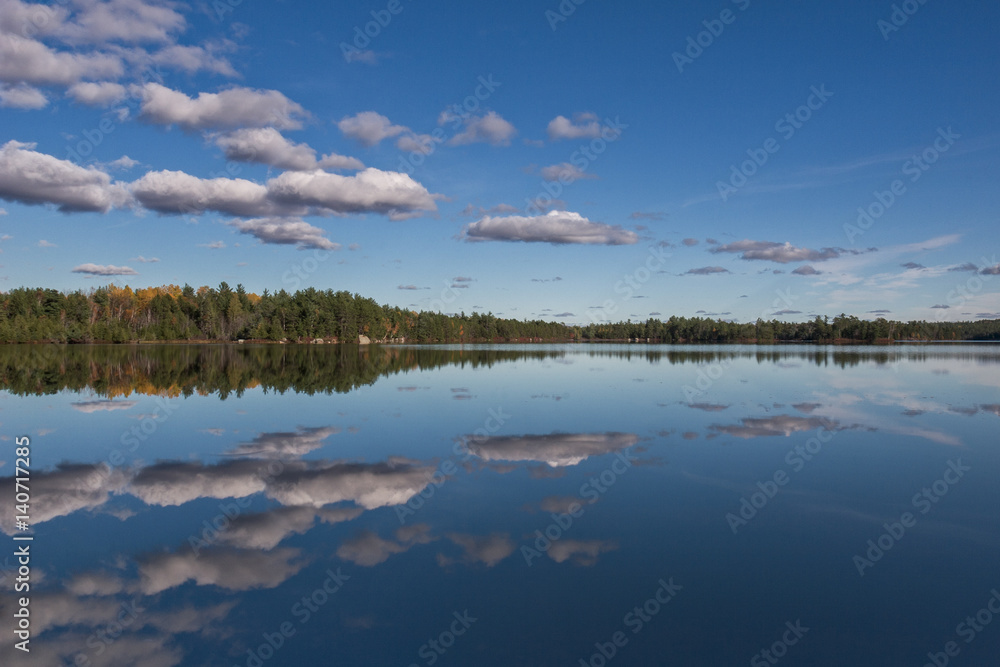 Sky reflection on a calm lake