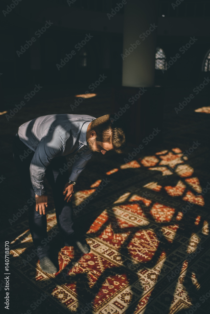 Muslim bowing in prayer
