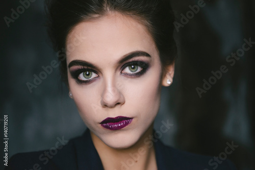 Portrait of a glamorous woman wearing sultry make-up