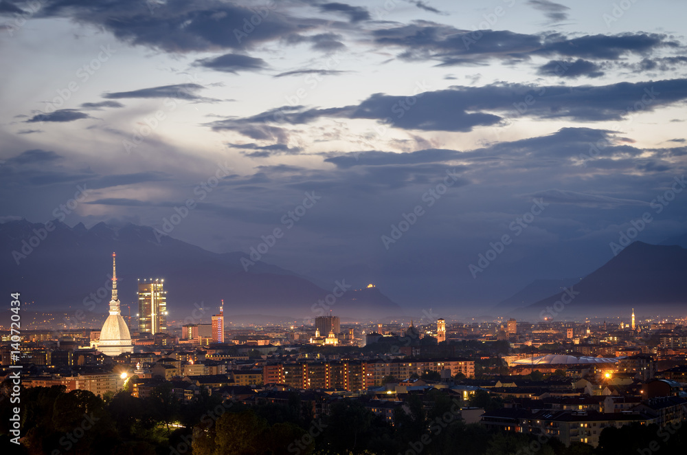 Turin cityscape with Mole Antonelliana and Sacra di San Michele