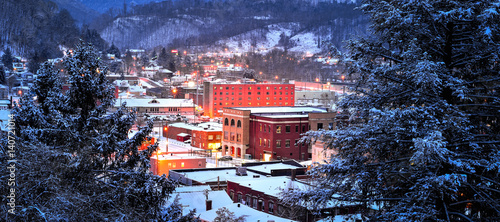 Canvas Print scenic mountain town, blue hour and fresh snow