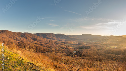 The Shenandoah valley shines a golden glow just before sunset with the mountains of Shenandoah National Park rising above © josephgruber