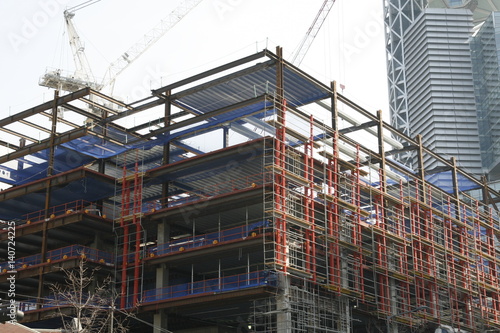 Unfinished steel frame building at a construction site 