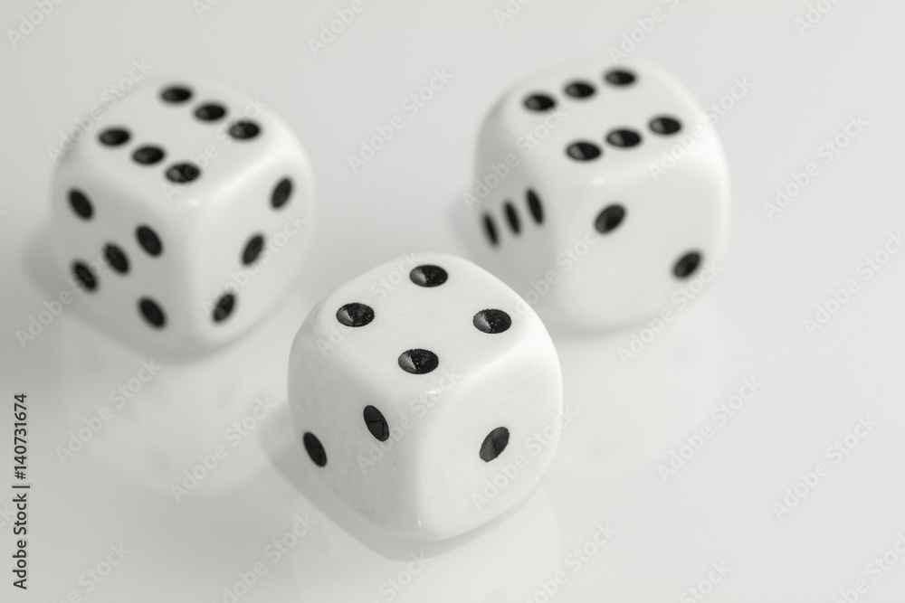 Three white dice isolated on Three white dice isolated on