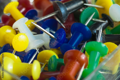many multi-colored buttons with the tip closeup.