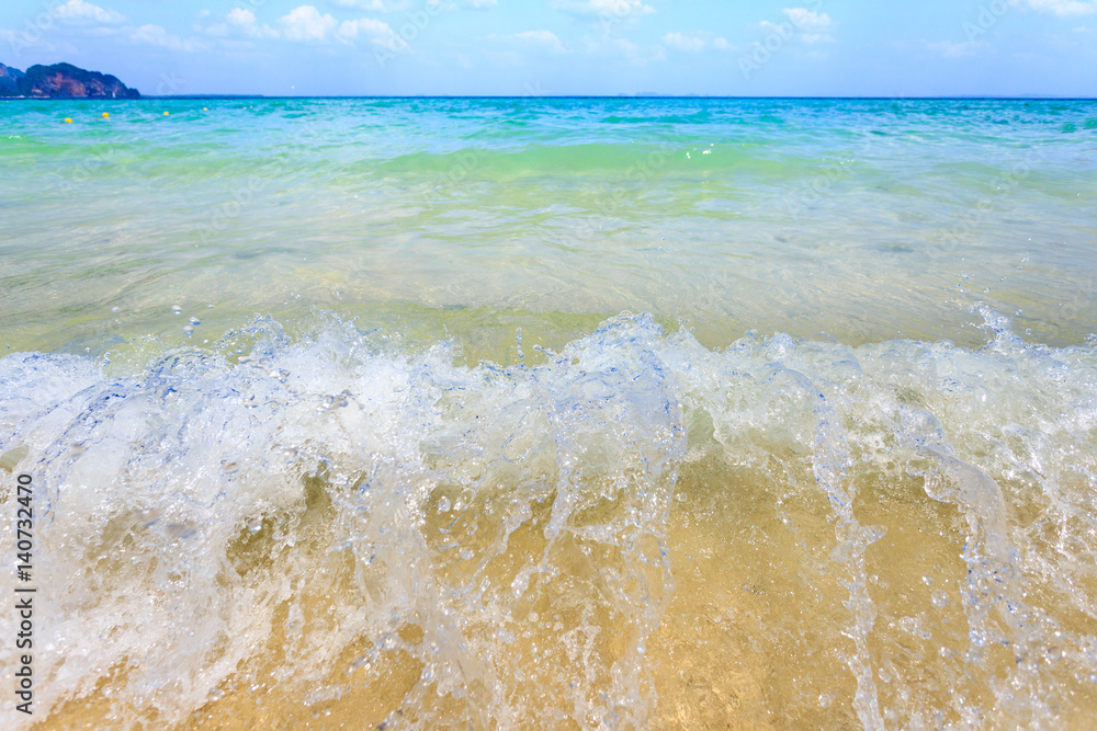 wave of the sea on sand beach