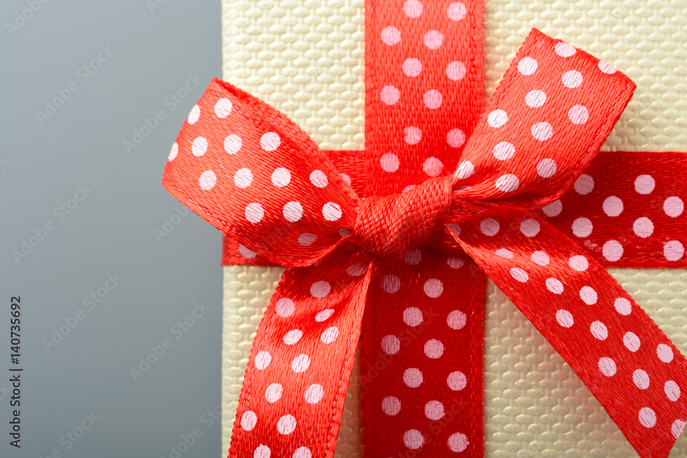 Red bow on gift box