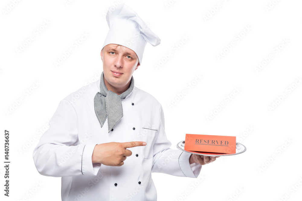 Portrait of a chef with a reserve on a tray isolated on white background