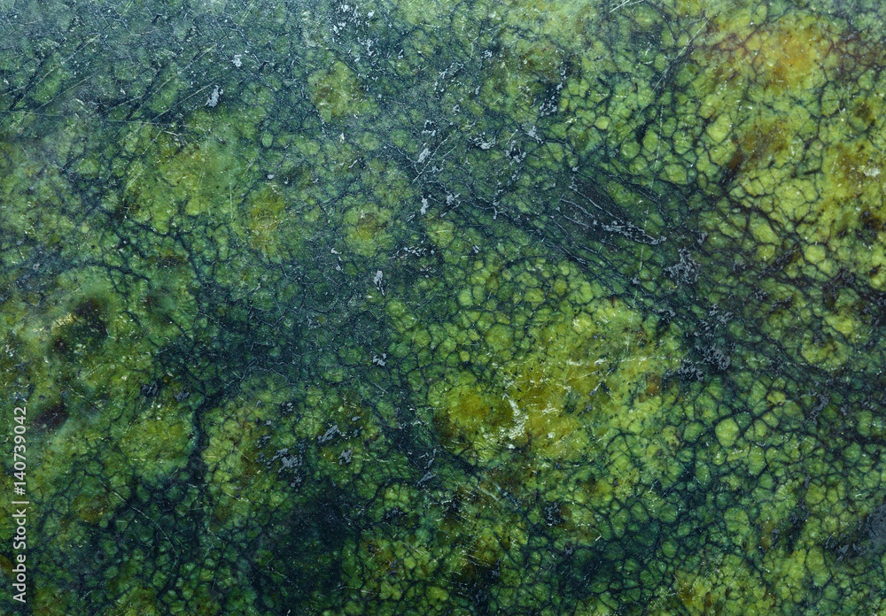 Close up of green stone as background Close up of green stone as background