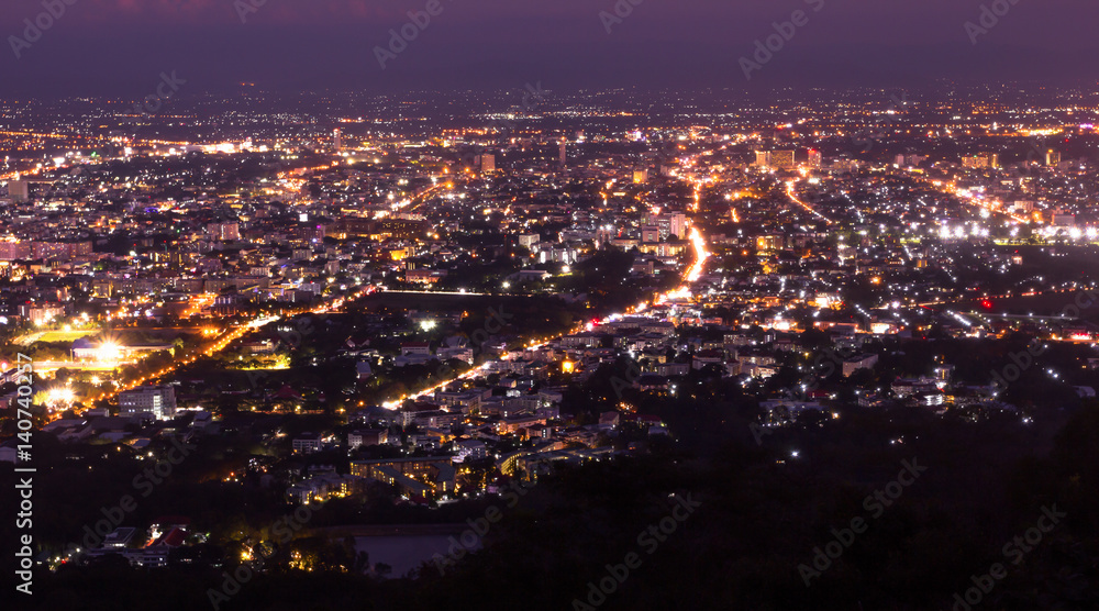 the night light of Chiangmai city, Thailand view from mountain in twilight period