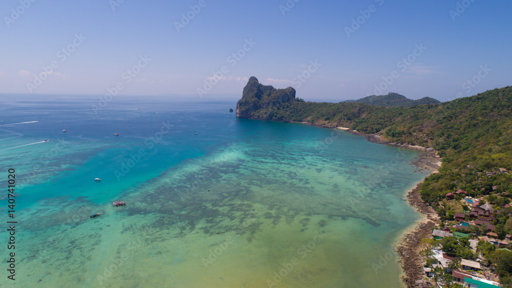 Aerial drone photo of sea and coastline from iconic tropical beach of Phi Phi island, Thailand