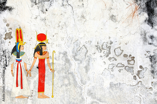 Grunge background with old stucco texture and Egyptian goddess Isis