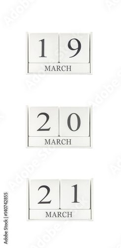 Closeup group of white wooden calendar with black 19 , 20 , 21 march word , three date calendar isolated on white background