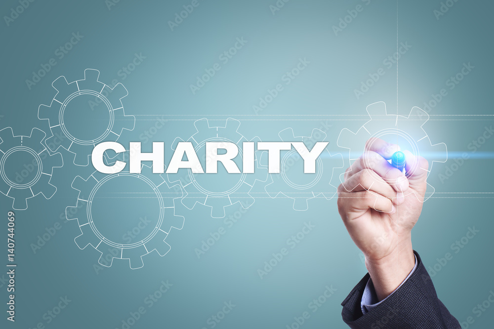 Businessman drawing on virtual screen. charity concept. Businessman drawing on virtual screen. charity concept.