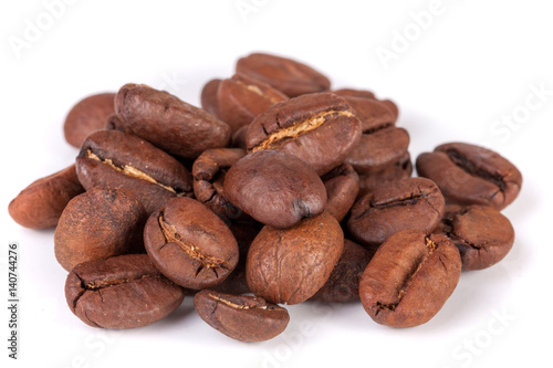 Pile of coffee beans isolated on white background