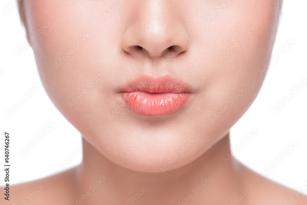 Young asian woman close up. Perfect natural lip makeup Young asian woman close up. Perfect natural lip makeup