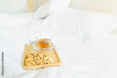 Breakfast in bed with cookies and coffee