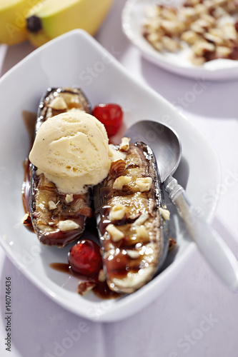 Banana split with vanilla ice creams and cherry
